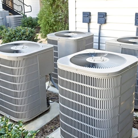 Air Conditioning Units In Apartment Complex — Heating & Cooling in Orange NSW