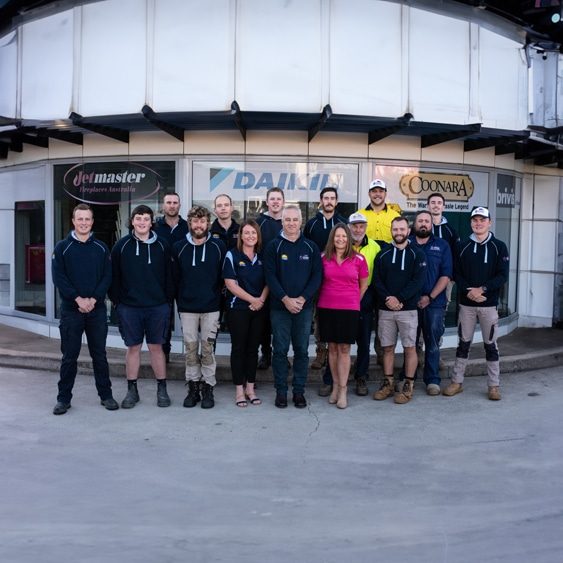 Group of People in Front of a Shop — Heating & Cooling in Central West NSW
