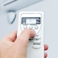 Turning on the Air Conditioner using Remote — Heating & Cooling in Orange, NSW