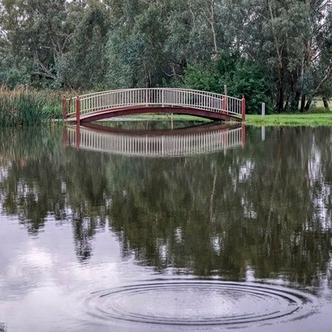 Wooden Bridge Over a Lake in Forbes — Heating & Cooling Near Me in Australia