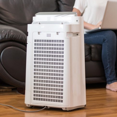 Air Purifier in a Living Room — Heating & Cooling in Orange NSW