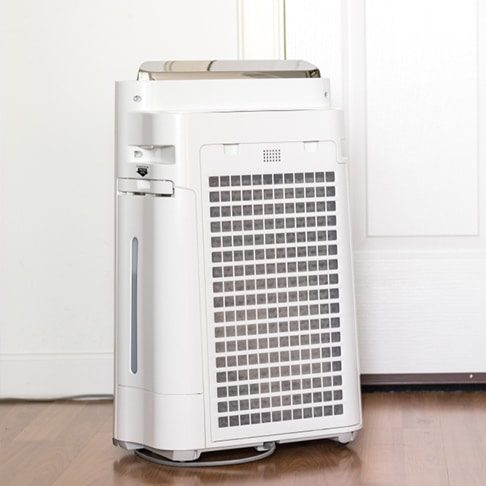 Air Purifier Machine in a House — Heating & Cooling in Air Conditioner and Heat Pump — Heating & Cooling in Air Conditioner and Heat Pump — Heating & Cooling in Cowra, NSW