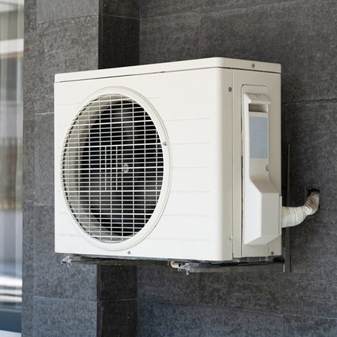 Wall Mounted Air Conditioner Compressor — Heating & Cooling in Cowra, NSW